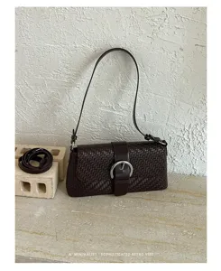 Dark brown woven baguette shoulder bag with silver buckle, retro minimalist style daily handbag.
