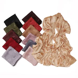 Detailed view of premium solid color leaf jacquard satin long scarf and square hijab.