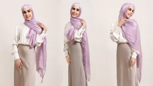 Elegant shiny satin hijab long scarf for women, solid purple smooth drape and style.