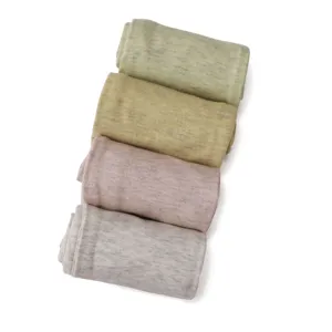 Close-up view of soft modal cotton arm sleeves rolled neatly in four pastel colors.