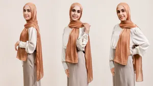 Close-up detail of shiny satin hijab showcasing smooth texture and elegant drape styling.