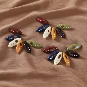 Colorful plastic hollow rhinestone star hair clips decorative pins set for women daily styling.
