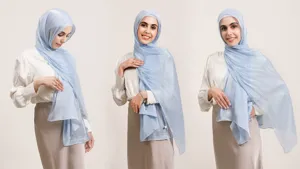 Detailed view of women's shimmer satin hijab scarf, lightweight draped long head wrap.