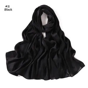 Black satin jacquard long scarf detail, soft breathable fabric, elegant drape and texture.
