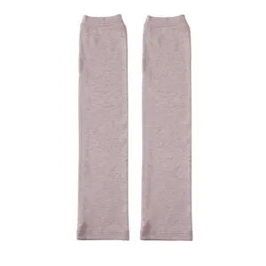 Close-up detail of soft modal cotton arm sleeves in solid pastel mauve color, elastic fit.