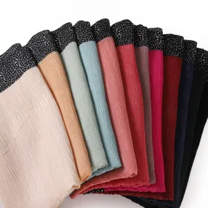 Versatile solid color pleated long scarf with black dot border, breathable women's hijab shawl.