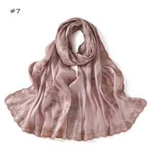 Pink sequin embroidered long scarf featuring delicate branch lace and soft shimmering fabric.