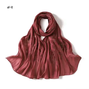 Elegant burgundy sequin embroidered silk satin hijab scarf, lightweight and breathable.