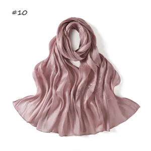 Pink satin silk scarf with delicate sequin embroidery, soft drape detail for women accessory.
