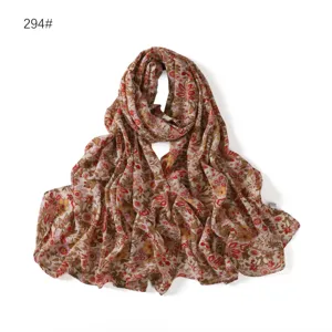 Detailed close-up view of the soft chiffon floral printed scarf, lightweight breathable material.