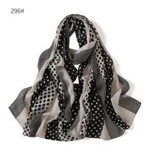 Black and white polka dot chiffon scarf, lightweight and breathable fashion accessory.