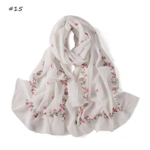 Women's white chiffon long scarf featuring elegant pink floral print and green vine details for spring.