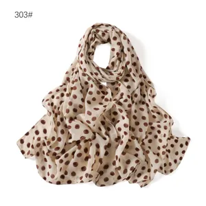 Chiffon scarf featuring elegant brown polka dots on a beige background, lightweight, stylish.