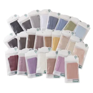 Detail shot of breathable ice silk ribbed arm sleeves in various colors, comfortable and sun protective.