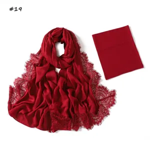 Close-up of red modal lace long scarf and matching inner hijab cap set, soft and breathable.