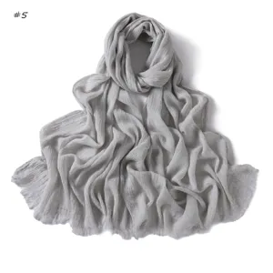 Grey crinkled cotton scarf detail, lightweight texture and soft fringed edge design.