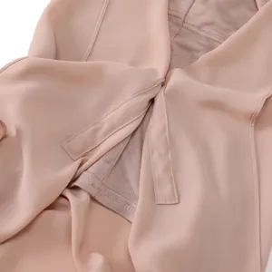 Chiffon hijab detail showing smooth fabric, delicate stitching and integrated design.