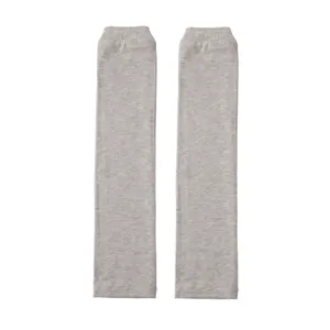 Detail view of light grey heathered modal arm sleeves, showing soft fabric texture and elastic cuffs.