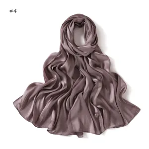 Detailed view of smooth satin long scarf with wide stripes, soft and breathable fabric drape.