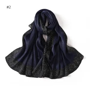 Pleated long scarf with black and white dotted edge, elegant navy blue design for women.