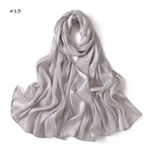 Grey imitation silk scarf detail, soft and smooth satin texture for women elegance.