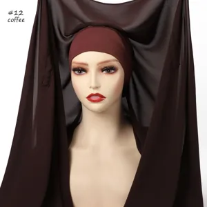 Detail shot of the coffee chiffon hijab showing silky texture and built-in magnetic closure.