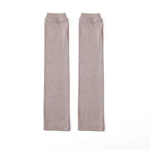 Detailed view of breathable modal heathered arm sleeves, soft elastic sun protection fabric.