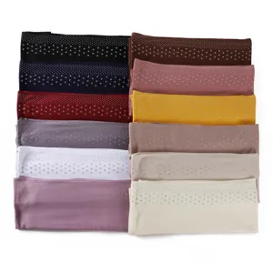 Detail shot of stretchy mercerized cotton long scarf with rhinestone details in multiple colors.