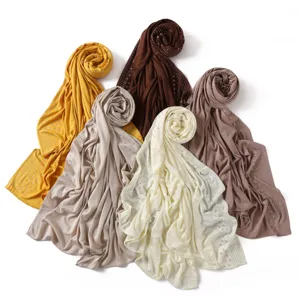 Solid color stretch jersey hijab scarf with delicate rhinestone details in multiple gorgeous colors.
