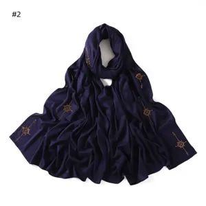 Solid color mercerized cotton jersey long scarf with gold rhinestone cross details for women.