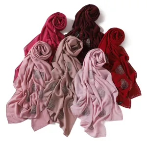 Chiffon long scarf detail, sparkling rhinestone rose patterns, soft draped fabric.
