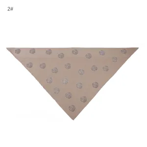 Detail view of the elegant khaki modal rhinestone rose triangular scarf showing the delicate texture.