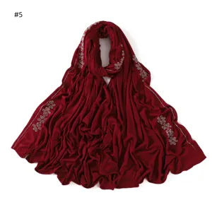 Burgundy mercerized cotton jersey hijab scarf featuring sparkling rhinestone floral line trim for women.