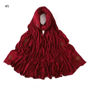 Wine red cotton hijab scarf with gold rhinestone cross pattern, elastic and comfortable.