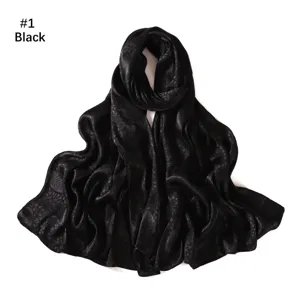 Black satin long scarf with elegant leaf jacquard pattern. Soft, smooth, and drapes nice.