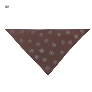 Close-up detail of the brown triangle scarf featuring sparkling rhinestone rose patterns and soft fabric.