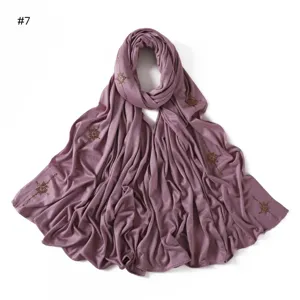 Solid color mercerized cotton long scarf with golden hot-fix rhinestones and elegant drape design.