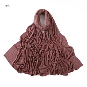 Solid color stretch mercerized cotton jersey hijab scarf decorated with sparkling rhinestones.