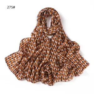 Chic brown and white patterned long chiffon scarf, lightweight and breathable accessory.