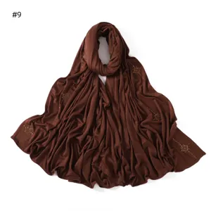 Brown mercerized cotton long scarf detail with rhinestone star patterns, soft and elastic fabric.