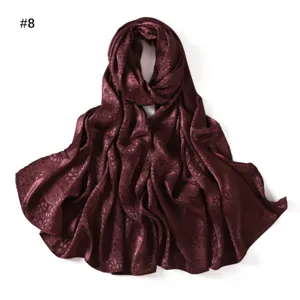 Burgundy satin jacquard leaf pattern long scarf detail, soft drape silk-like material shawl.