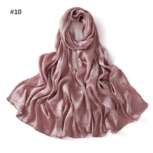 Detailed view of the elegant satin long scarf featuring a subtle jacquard pattern.
