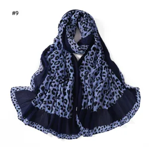 Blue leopard print pleated scarf detail view, lightweight breathable fashion accessory for women.