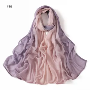 Detailed view of the gradient crinkled long scarf, soft breathable fabric with stylish pleats.
