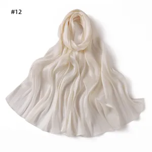 Detailed view of the shiny satin long scarf, featuring a soft draped crinkle texture for summer.