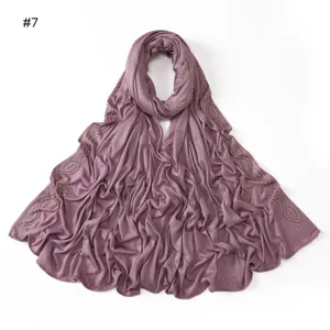 Detailed view of the mercerized cotton hijab scarf featuring exquisite rhinestone paisley design.