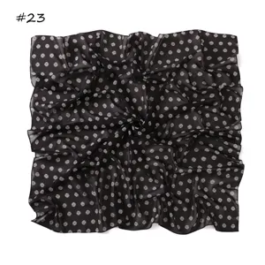 Classic black chiffon square scarf featuring a stylish white polka dot pattern for women.