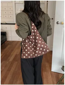 Suede polka dot shoulder bag for women, retro autumn fashion large capacity tote bag detail.