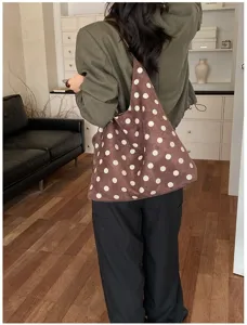 Suede polka dot shoulder bag for women, retro large capacity tote bag for autumn fashion.