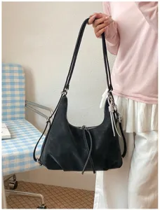 Sac à dos polyvalent pour femme, grand sac à bandoulière de grande capacité pour le travail.
